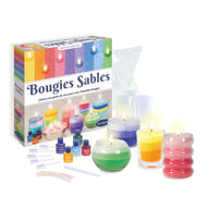 Colourful candle-making kit with candles and supplies on a white background
