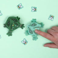 Origami jumping frogs